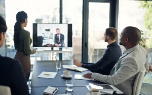 a group of people sitting at a table