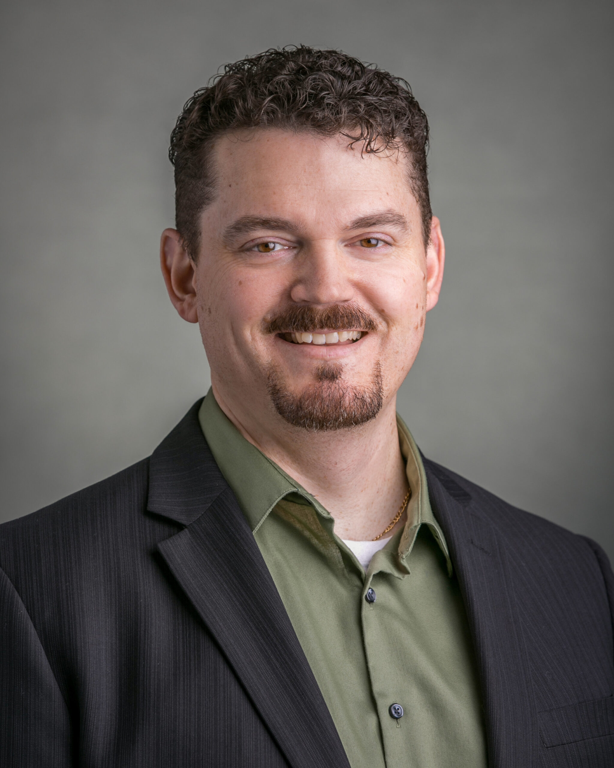 Professional headshot of Dwayne Crocker