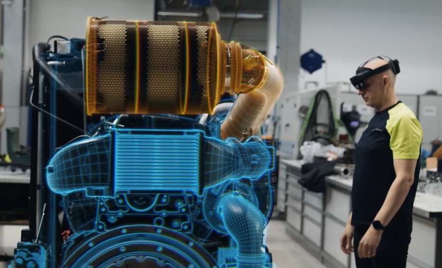 Volvo Penta technician asks Microsoft Copilot in Dynamics 365 Guides to highlight part of a marine engine.