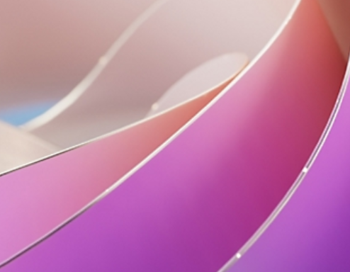 A decorative image of swirling purple abstract art