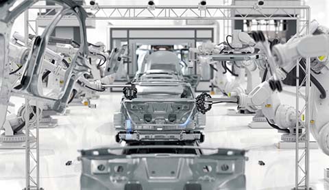 Man sieht eine Produktionsstraße in einer Fabrik und Roboterarme.