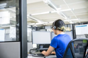 Woman working in a call centre.