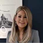 a woman smiling for the camera