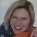 a woman smiling for the camera