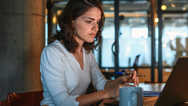 women working on her laptop.