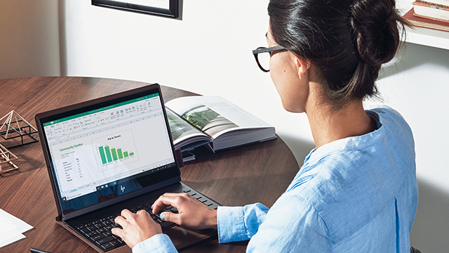woman working on laptop.