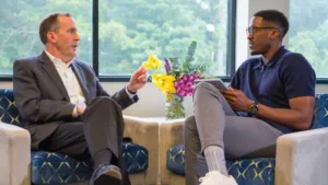 a couple of people that are sitting on a table