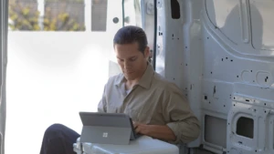man working on his surface pro