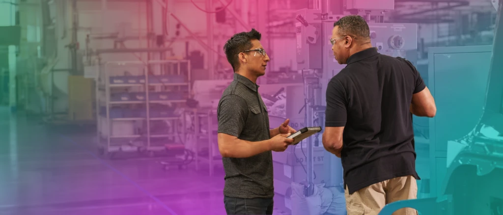 2 men working on the field with a gradient background