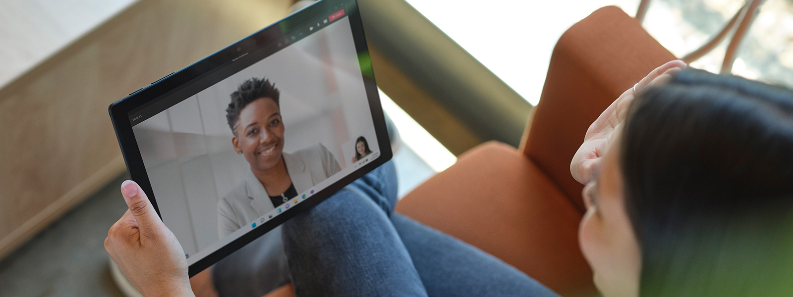 An interviewer and interviewee on a Teams online meeting