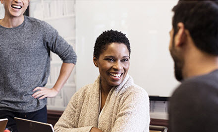Small conference meeting in modern workspace.