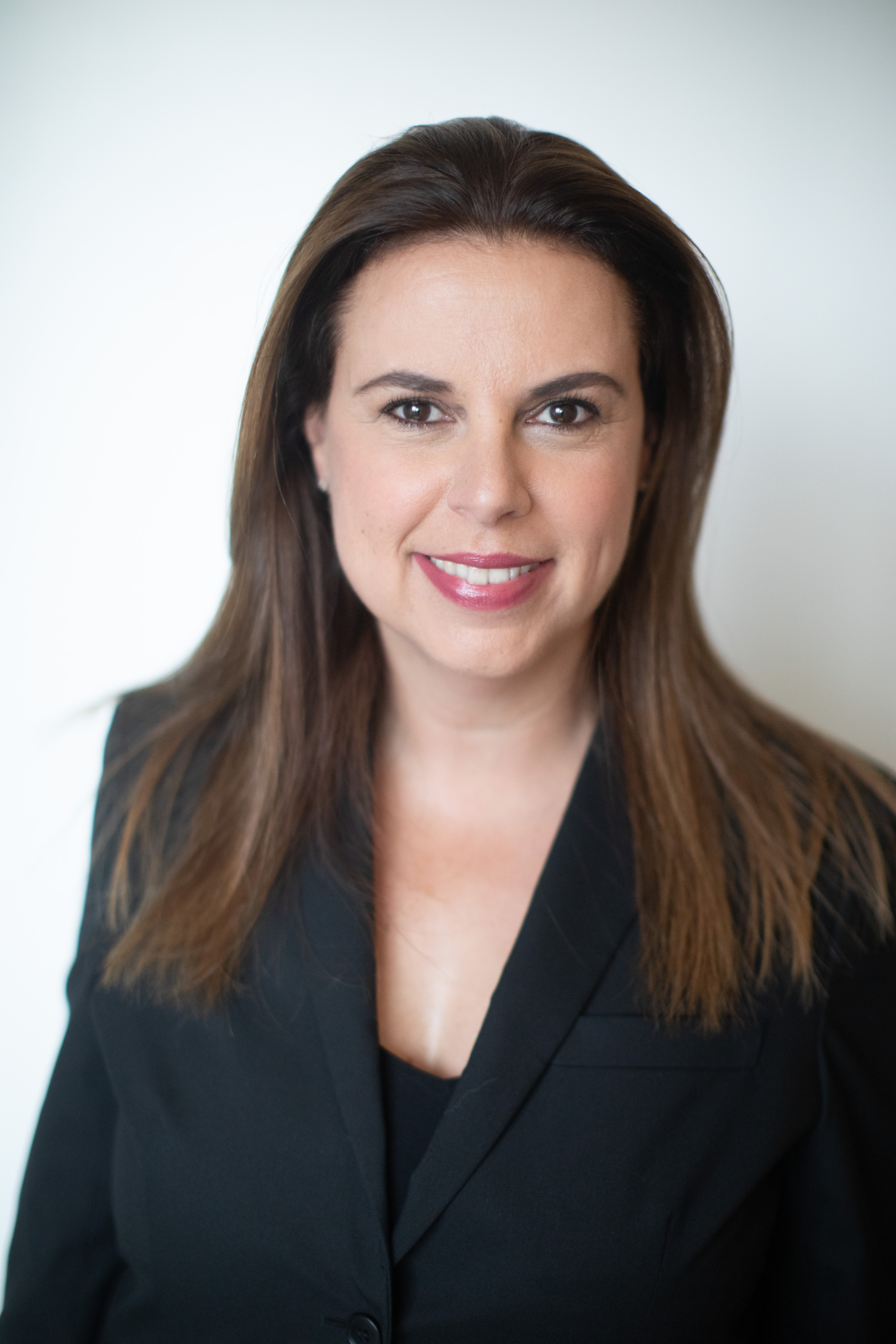 a person smiling for the camera