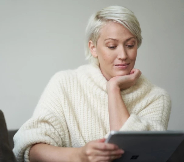 a woman using a laptop computer