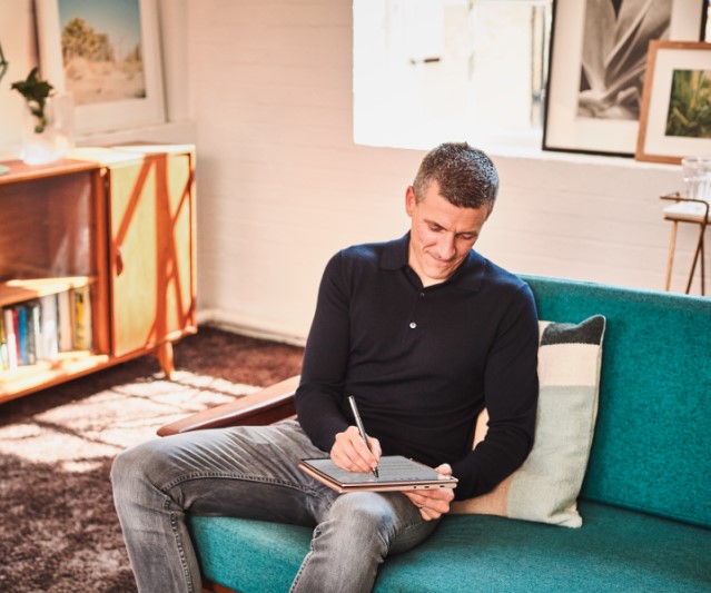 a man sitting on a chair