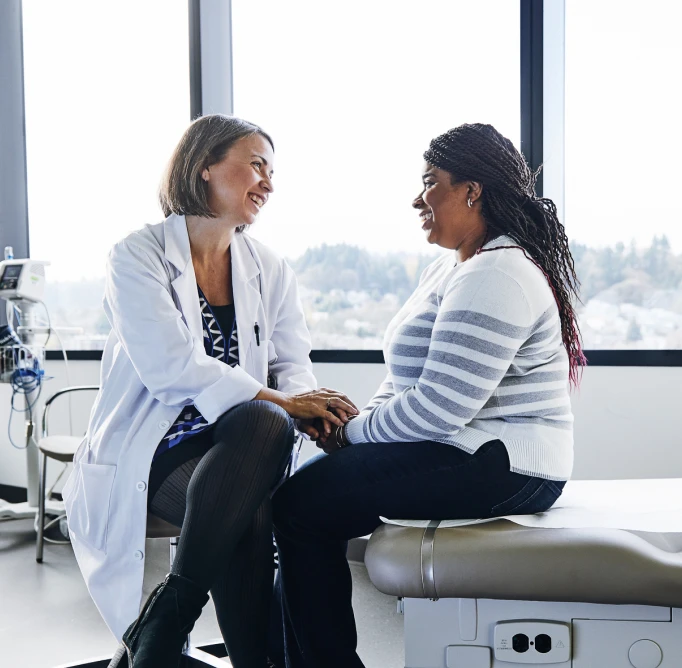 A doctor talking to a patient