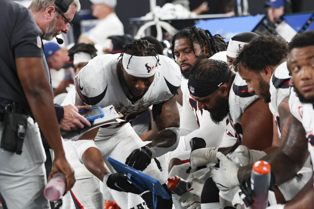 A group of football players in a group