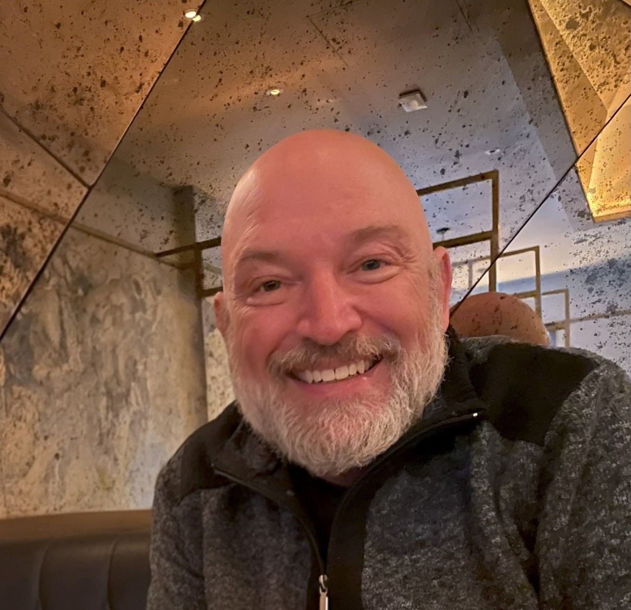 A man smiling for a selfie