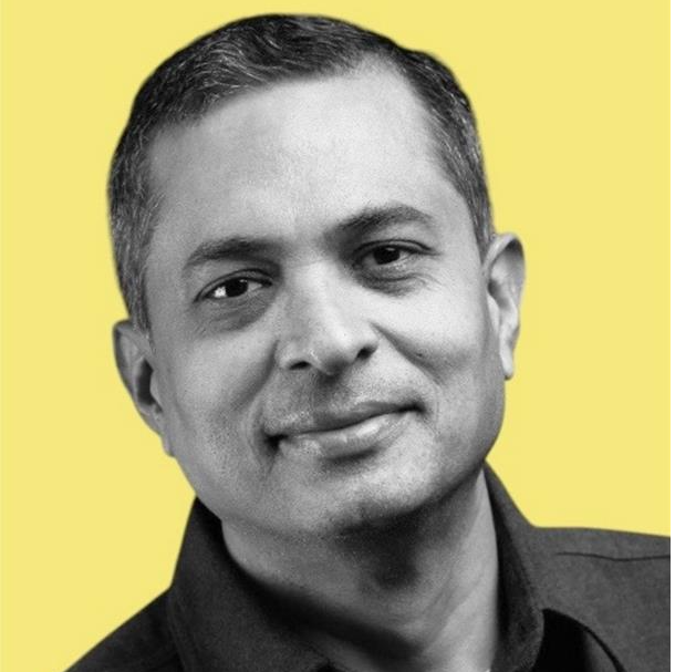 Professional headshot for Srini Raghavan, Corporate Vice President, Microsoft 365 Copilot Ecosystem.