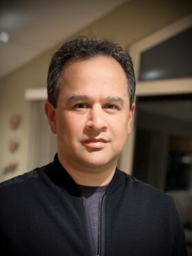 Professional headshot of Ricardo Villarreal.