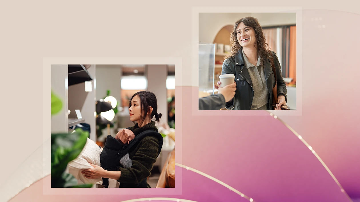 Professional receiving coffee in a modern caf&eacute; setting; a person holding a baby in a carrier.