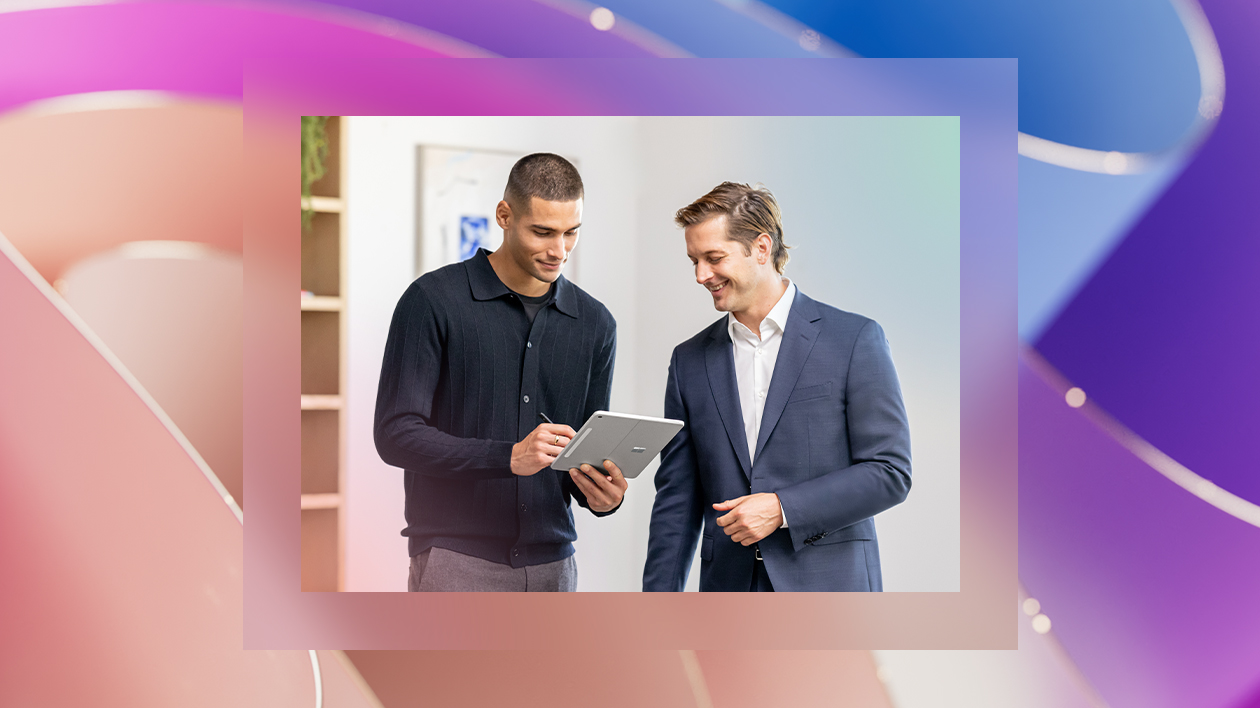 An abstract background with an image of two people looking at a tablet