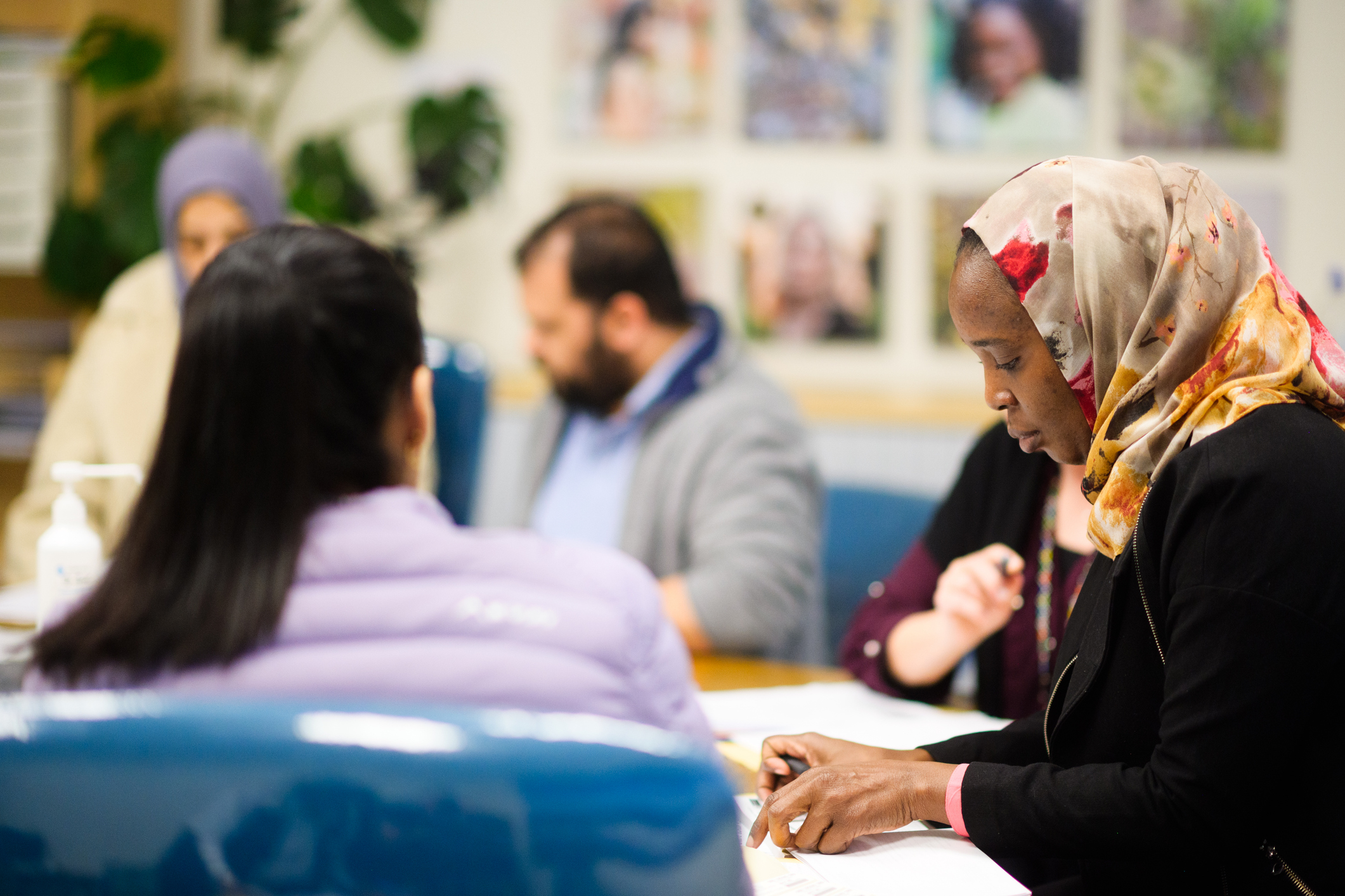 People sitting at an office table