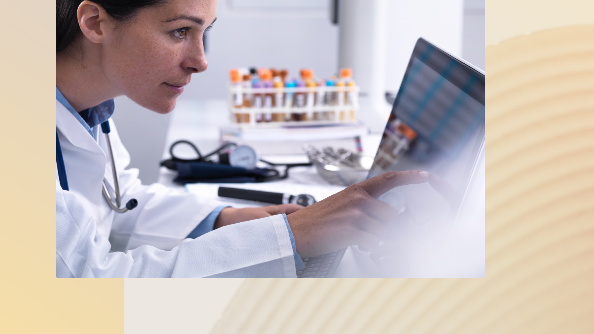 A doctor working on a tablet