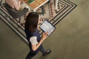 Woman holding laptop