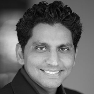 A close-up of a man smiling