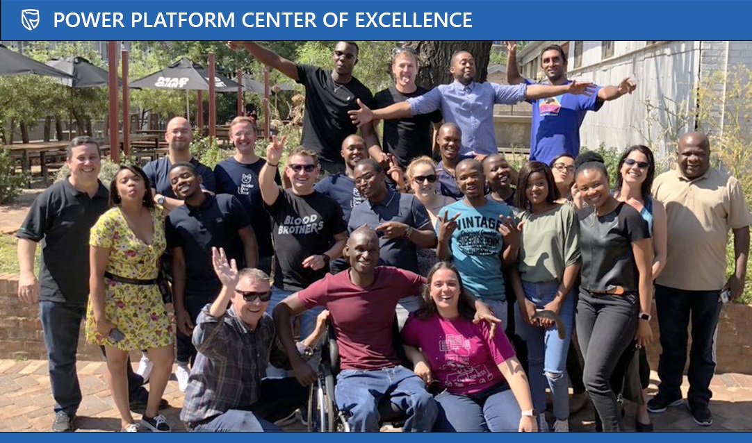 a group of people posing for a photo