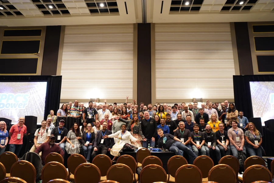 A group of people posing for a photo at the 2023 Power Platform Community Conference.