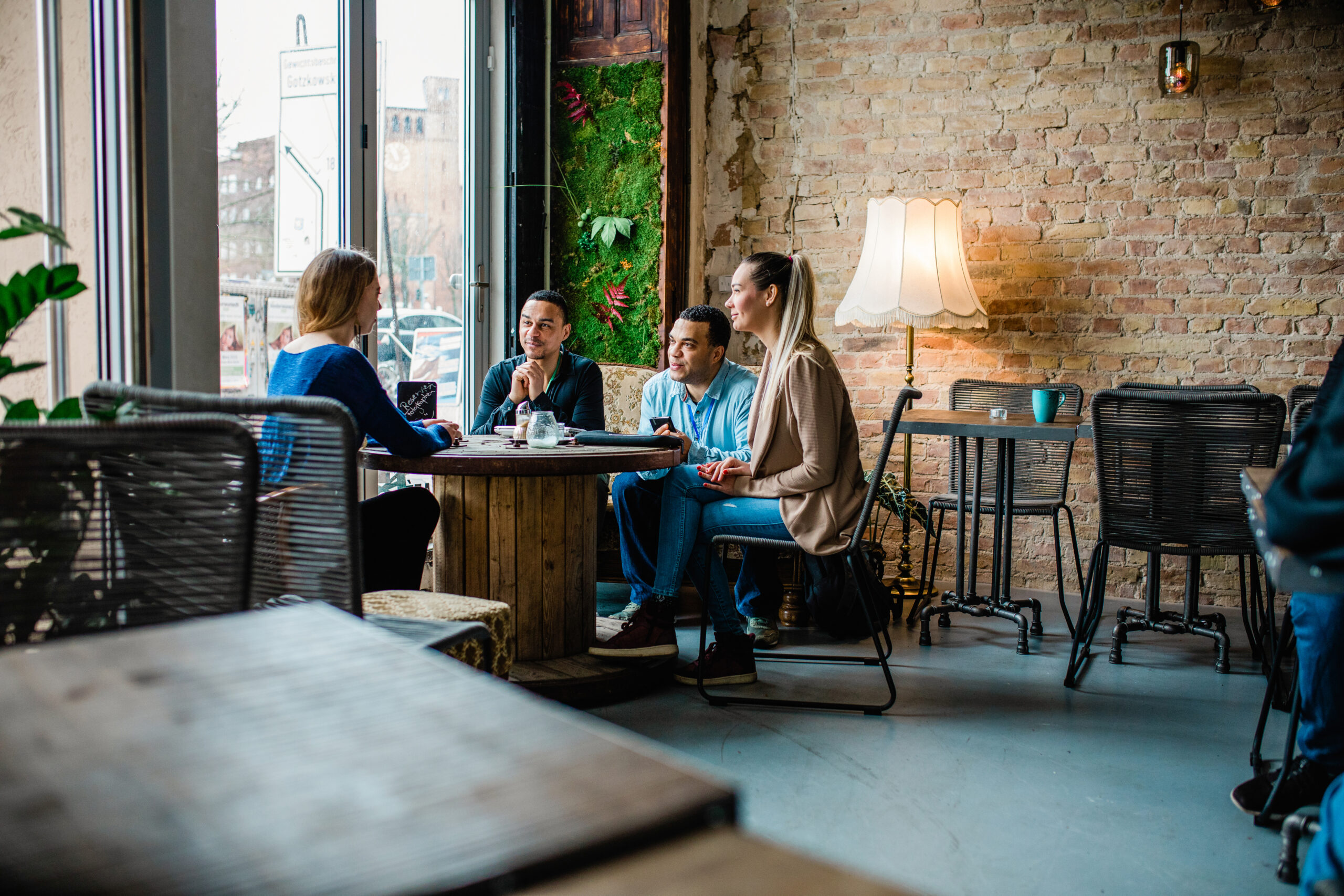 A group of people sitting at a table