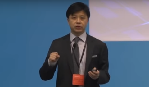 Hsiao-Wuen Hon wearing a suit and tie