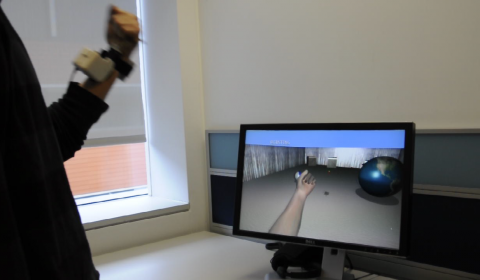 a person standing in front of a computer