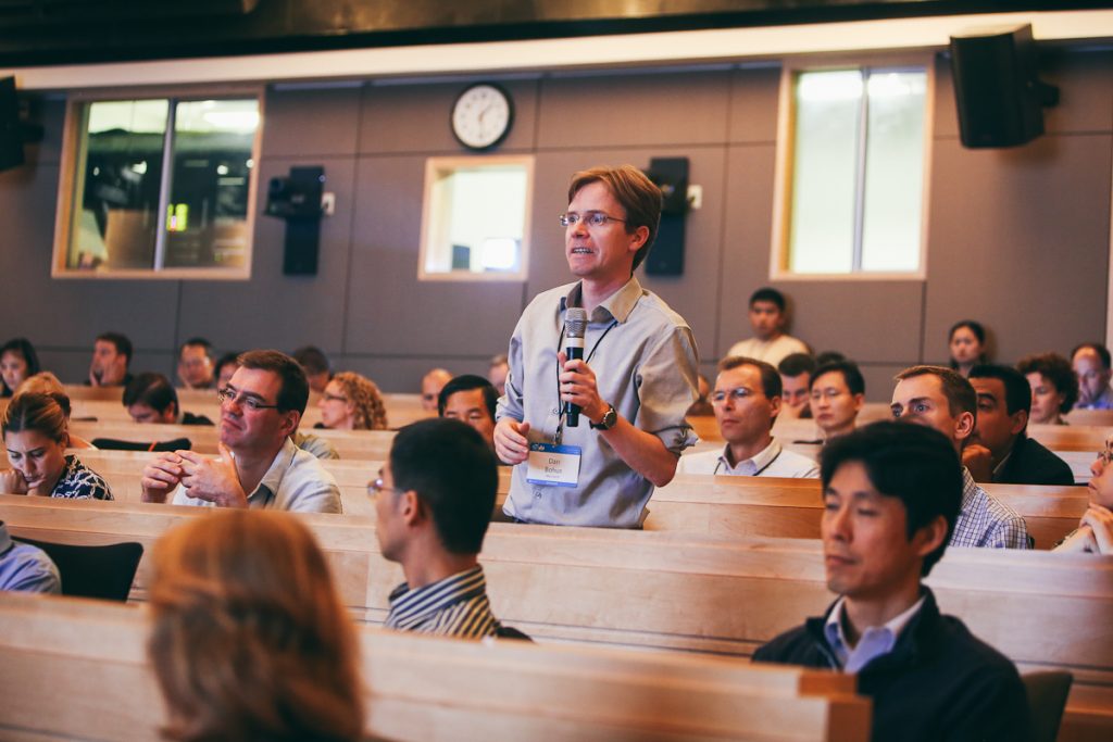 a group of people sitting at a table