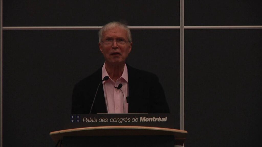 a man standing at a podium