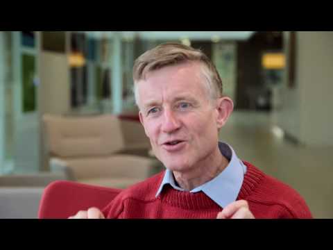 Simon Peyton Jones wearing a suit and tie