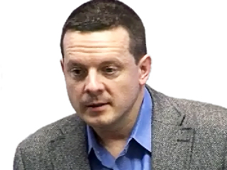 a man wearing a suit and tie