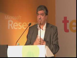 Nandan Nilekani in a suit and tie