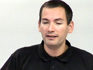 a man smiling for the camera