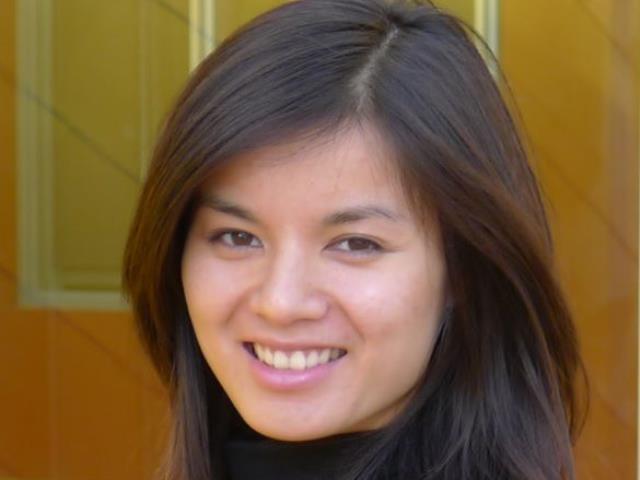 Jean Yang smiling for the camera