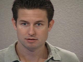 a man looking at the camera