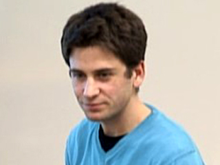 a man in a blue shirt