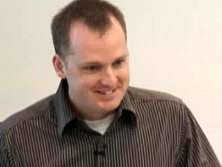 a man smiling for the camera