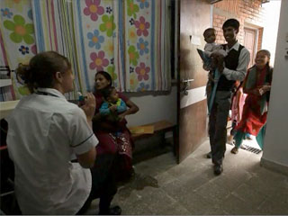 a group of people standing in a room
