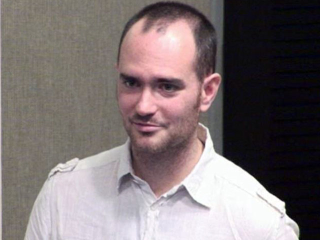 a man looking at the camera