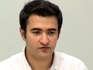 a man smiling for the camera