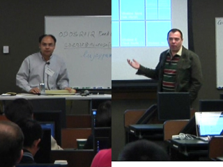 a group of people sitting at a desk