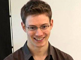 a man smiling for the camera