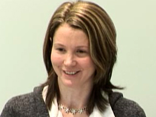 a woman smiling for the camera